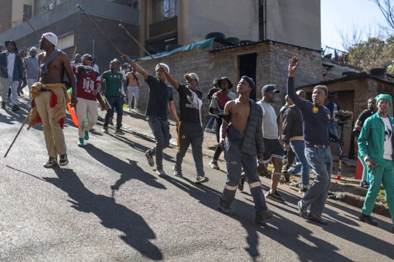 Photos: Thousands flee South Africa as anti-immigrant deadline sparks nationwide protests