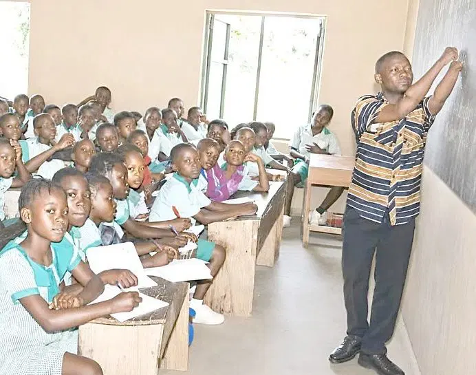 Rev. Teryima: Teacher born without fingers, toes; has 3 daughters, master’s degree, plays football  