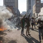 Looting, arrests follow South Africa’s anti-immigrant protests